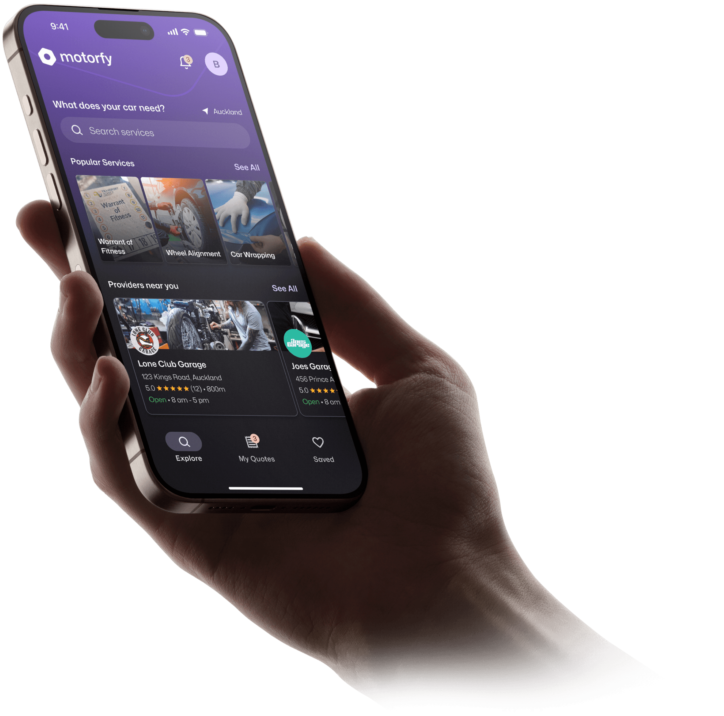 A hand holding a phone with the Motorfy app open